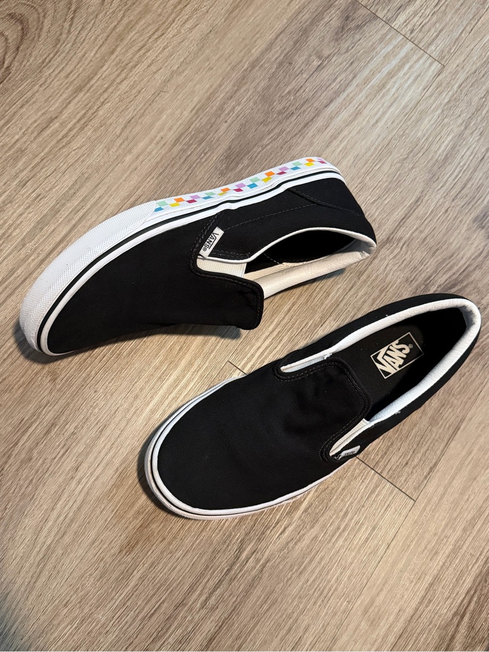 Women’s Vans Black Slip-On Sneakers with Multicolor checkered Accents